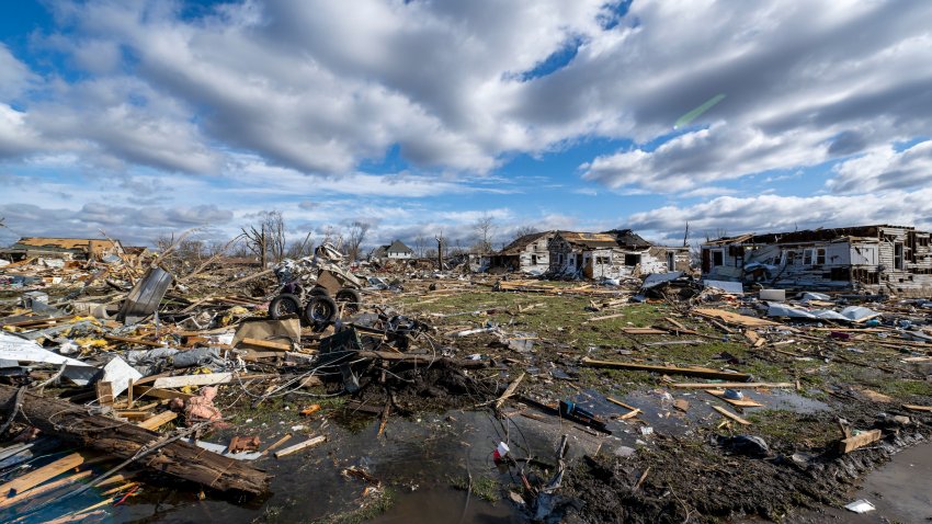 Damage from a late-night tornado is seen in Sullivan, Ind., Saturday, April 1, 2023. Multiple deaths were reported in the area following the storm.