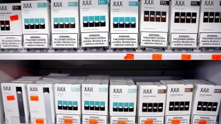 File - Packages of Juul e-cigarettes are displayed for sale in the Brazil Outlet shop on June 22, 2022 in Los Angeles.