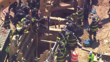 Emergency crews rush to pull workers from construction rubble at JFK Airport.