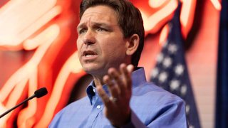 Florida Gov. Ron DeSantis speaks during the annual Feenstra Family Picnic at the Dean Family Classic Car Museum in Sioux Center, Iowa, May 13, 2023.