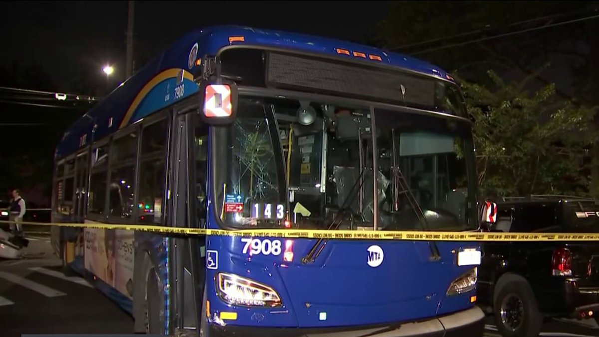 Several cars struck by MTA bus, stacked on top of each other in