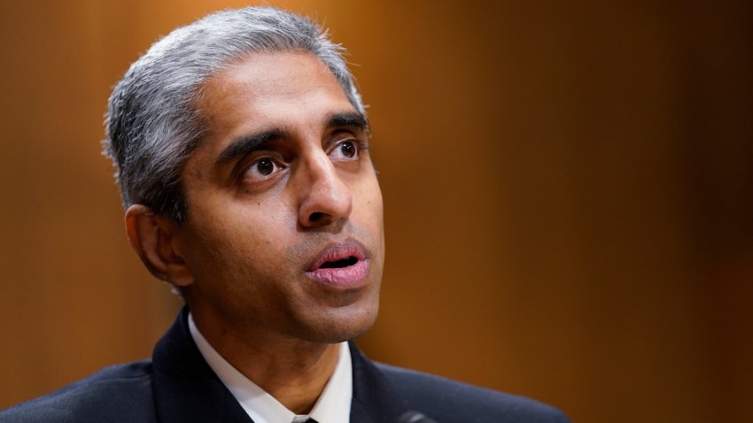 FILE – Surgeon General Dr. Vivek Murthy testifies before the Senate Finance Committee on Capitol Hill in Washington, on Feb. 8, 2022, on youth mental health care. Widespread loneliness in the U.S. is posing health risks as deadly as smoking a dozen cigarettes daily, costing the health industry billions of dollars annually, the U.S. surgeon general said Tuesday in declaring the latest public health epidemic. About half of U.S. adults say they’ve experienced loneliness, Murthy said in a new, 81-page report from his office. (AP Photo/Susan Walsh, File)