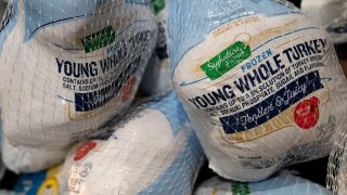 Bags of turkey await an annual Thanksgiving food giveaway