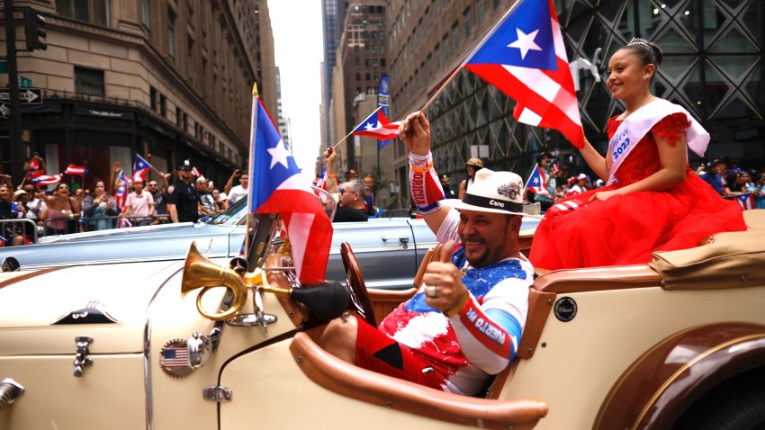 People participate in the 66th annual National Puerto Rican Day Parade in New York City on June 11, 2023. The 2023 theme for the event is “Música, Cultura y Alegría” (“Music, Culture and Joy”). (Photo by Kena Betancur / AFP) (Photo by KENA BETANCUR/AFP via Getty Images)