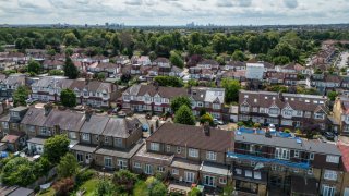 Residential properties are pictured in an aerial view on June 26, 2023 in Enfield, England. According to data from the Financial Conduct Authority, borrowers in the London Borough of Enfield have the biggest mortgages relative to their income in the U.K.