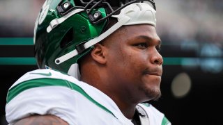 Quinnen Williams #95 of the New York Jets warms up against the Cincinnati Bengals at MetLife Stadium on September 25, 2022 in East Rutherford, New Jersey.