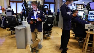 Traders work on the floor of the New York Stock Exchange (NYSE) on August 02, 2023 in New York City.