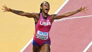 USA’s Sha’Carri Richardson reacts after crossing the finish line to win the women’s 100m final during the World Athletics Championships at the National Athletics Centre in Budapest on Aug. 21, 2023.