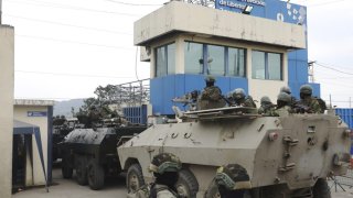 Armored vehicles enter the Deprivation of Liberty Center of the Zone 8 in Guayaquil, Ecuador, Saturday, Aug. 12, 2023.