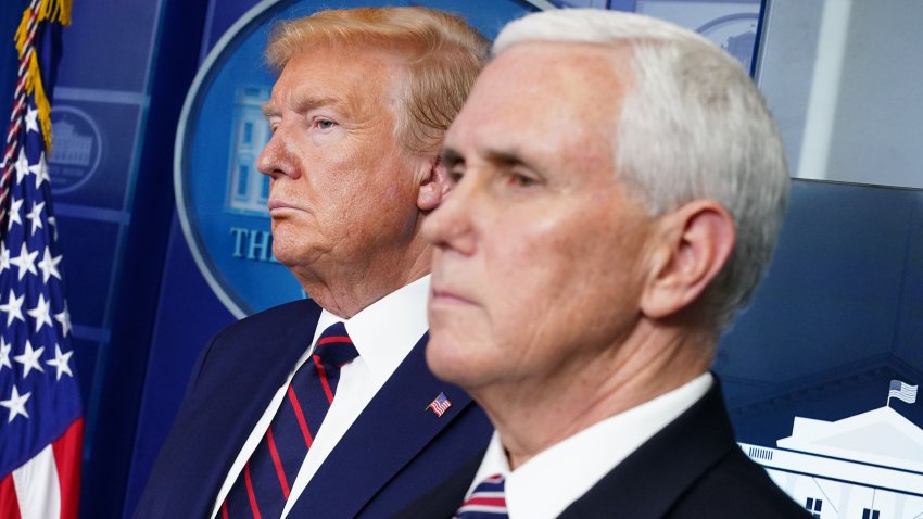 US President Donald Trump and US Vice President Mike Pence look on during the daily briefing on the novel coronavirus, COVID-19, in the Brady Briefing Room at the White House on April 2, 2020, in Washington, DC.