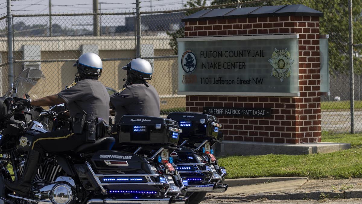 Trump codefendants John Eastman, Scott Hall surrender to authorities