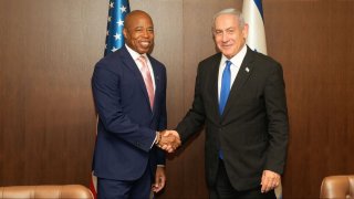 Mayor Eric Adams and Prime Minister Benjamin Netanyahu shake hands during the former's trip to Israel.