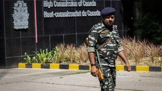 A security personnel stands guard outside the Canadian High-Commision in New Delhi, India, September 19, 2023. 