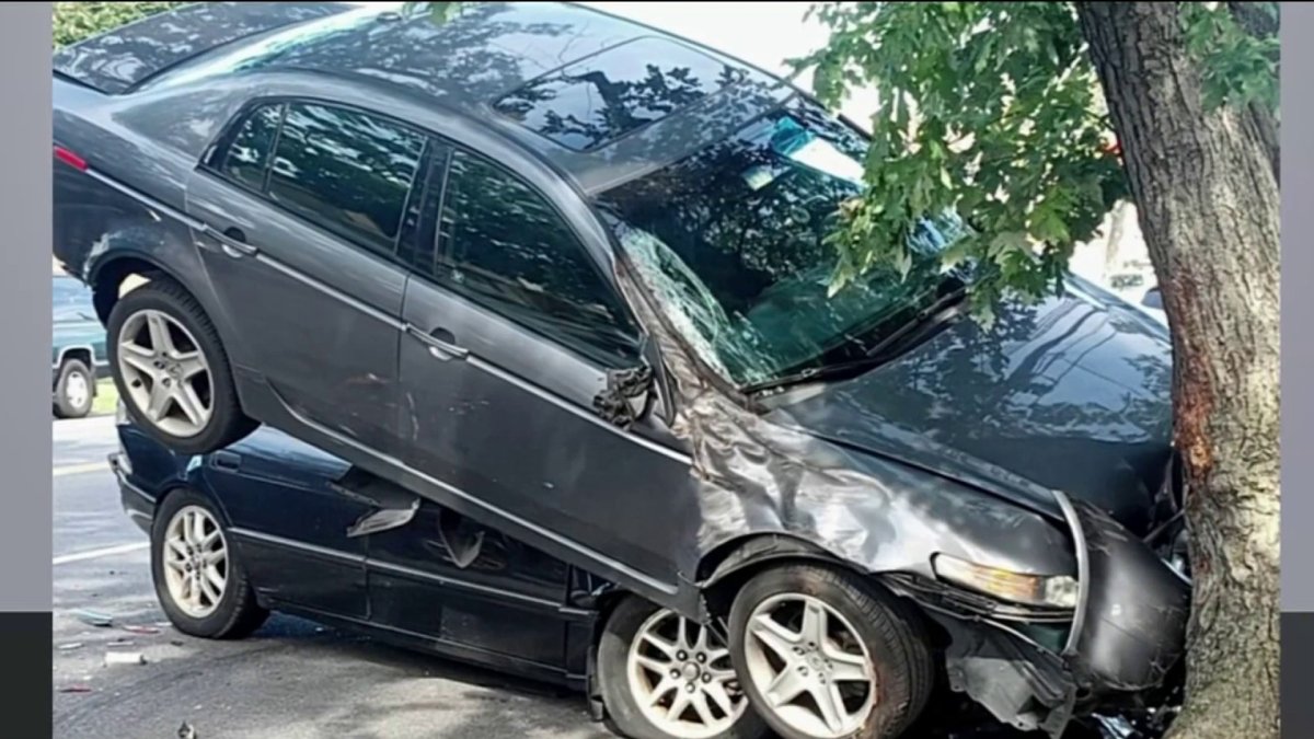 Several cars struck by MTA bus, stacked on top of each other in