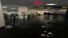 LaGuardia Airport's Terminal A reopens after flooding, travelers walking in inches of water