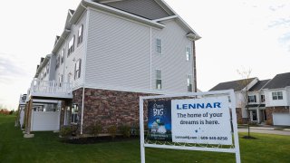 Signage is seen at The Collection at Morristown, a housing development by Lennar Corporation, in Morristown, New Jersey, November 13, 2021.