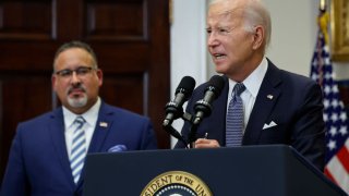 President Joe Biden is joined by Education Secretary Miguel Cardona as he announces new actions to protect borrowers after the Supreme Court struck down his student loan forgiveness plan, in the Roosevelt Room at the White House in Washington, D.C., on June 30, 2023.