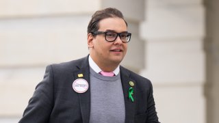 Rep. George Santos, R-N.Y., walks up the House steps for a vote in the U.S. Capitol on Sept. 28, 2023.