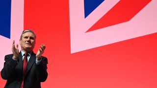 LIVERPOOL, U.K. – Oct. 11, 2023: Britain’s main opposition Labour Party leader Keir Starmer applauds a speaker the final day of the annual Labour Party conference in Liverpool, northwest England, on October 11, 2023.