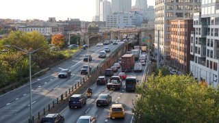 NEW YORK, NY – NOVEMBER 9: Vehicles travel on the Brooklyn-Queens Expressway (BQE) through the Dumbo neighborhood of Brooklyn on November 9, 2021, in New York City.