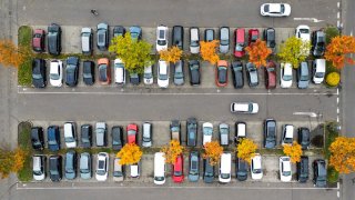Overhead view of a parking lot with parked cars