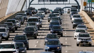 Heavy traffic heads south on Interstate 93 over the Zakim Bridge on Sept. 1, 2023, in Boston.