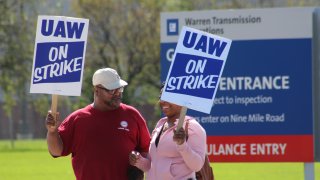 United Auto Workers members picket outside a General Motors transmission plant on Sept. 18, 2019 in Warren, Mich.