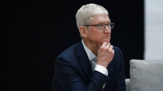 Apple CEO Tim Cook looks on following a conversation on mental health, during a spousal program on the last day of the Asia-Pacific Economic Cooperation (APEC) Leaders’ Week at Apple Park in San Francisco, California, on November 17, 2023.