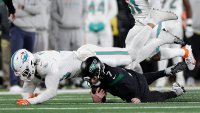 Dolphins' Holland calls MetLife Stadium turf ‘trash' after teammate Phillips injures Achilles tendon