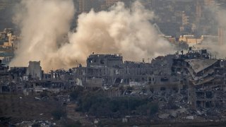 Smoke rises from an explosion in the Gaza Strip as seen from southern Israel, Nov. 14, 2023.