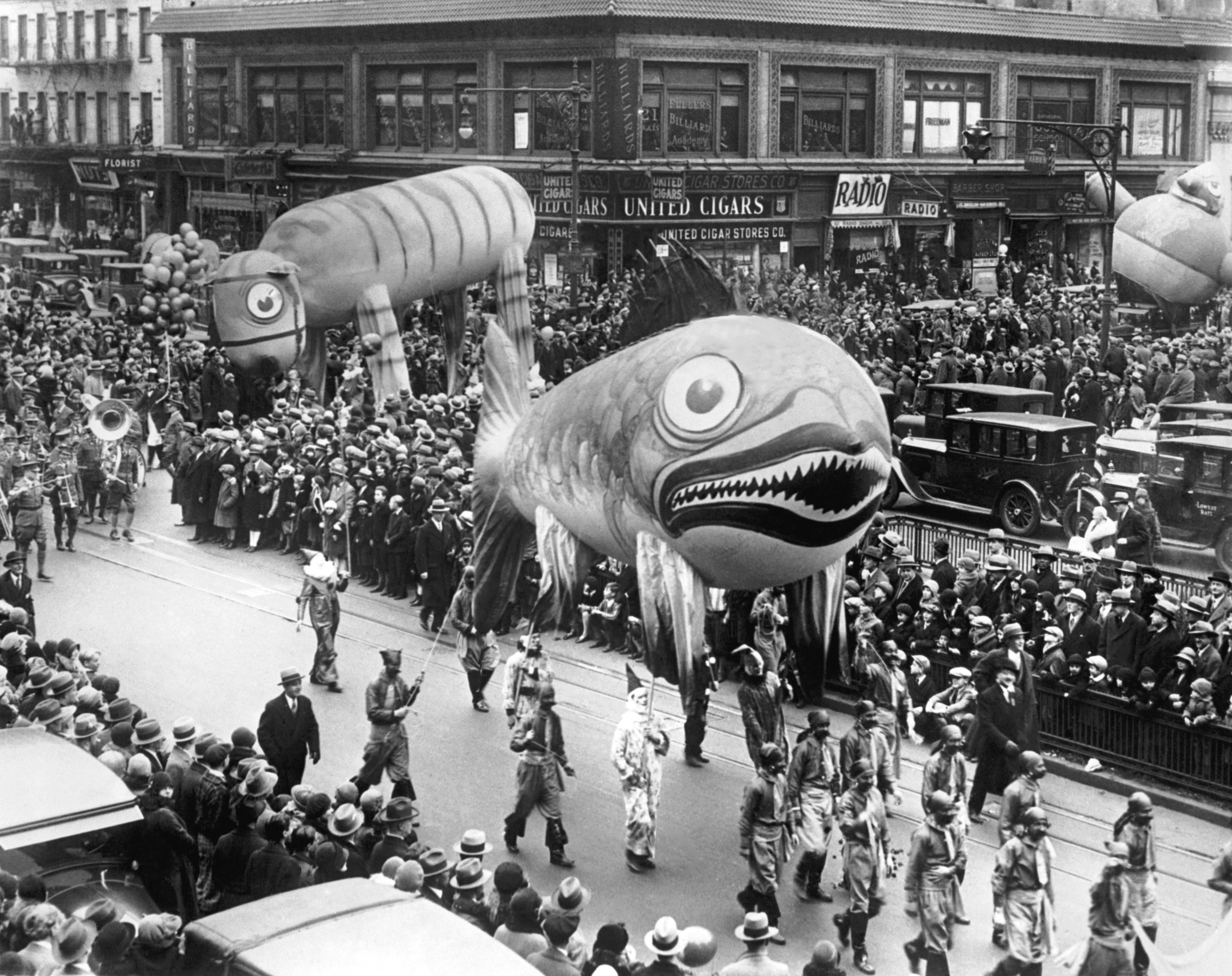 Part of the Thanksgiving Day Parade that officially brings Santa Claus into the Metropolis, New York, New York, 22nd November 1928. The Fish Balloon is 35 feet long, while the Tiger Balloon is 60 feet long, and will be released as the parade nears its end on Broadway. (Photo by Underwood Archives/Getty Images)