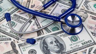 Stethoscope with money in the background