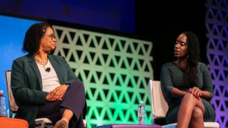 AnitaB.org CEO Brenda Wilkerson speaks on a panel with Dr. Jackie Bouvier Copeland at the 2019 Grace Hopper conference.