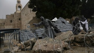 A nativity scene decorated to honor the victims in Gaza is displayed in Manger Square