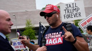 A supporter of former U.S. President Donald Trump is interviewed outside of the E. Barrett Prettyman U.S. Courthouse on August 03, 2023 in Washington, DC. Trump is scheduled to be arraigned this afternoon after being indicted on four felony counts for his alleged efforts to overturn the 2020 election.