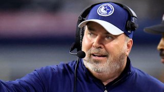 ARLINGTON, TEXAS – NOVEMBER 30:  Head coach Mike McCarthy of the Dallas Cowboys talks with a referee on the sidelines during the 2nd quarter of the game against the Seattle Seahawks at AT&T Stadium on November 30, 2023 in Arlington, Texas.