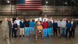 10 Americans released by Venezuela pose for a photo after arriving back in the U.S.