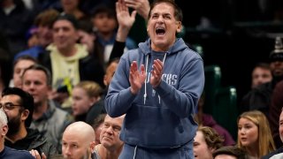 Owner Mark Cuban of the Dallas Mavericks cheers during the first half of the game between the Dallas Mavericks and the New Orleans Pelicans at American Airlines Center on January 15, 2024.