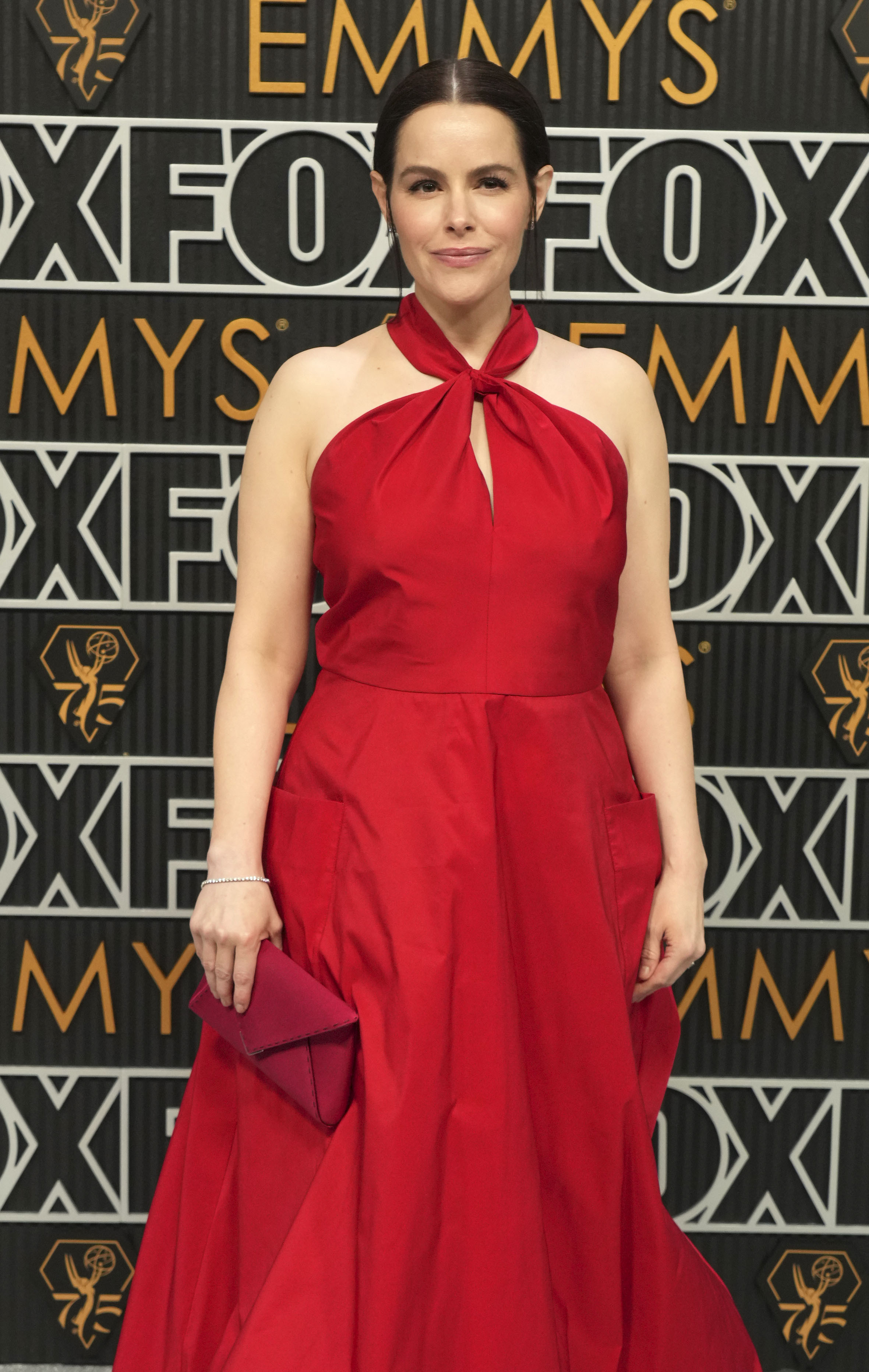 Emily Hampshire poses for a Red Carpet portrait at the 75th Emmy Awards on Monday, Jan. 15, 2024 at the Peacock Theater in Los Angeles. (Photo by Jordan Strauss/Invision for the Television Academy/AP Images)