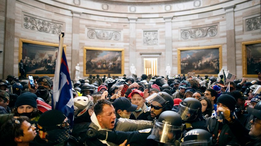 Police clash with supporters of Donald Trump who breached security and entered the Capitol building in Washington D.C., United States on January 6, 2021. Pro-Trump rioters stormed the US Capitol as lawmakers were set to sign off on President-elect Joe Biden’s electoral victory in what was supposed to be a routine process headed to Inauguration Day.