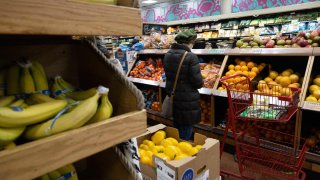 A person shops at a supermarket in New York City on December 14, 2022.