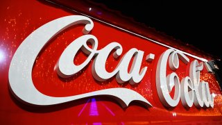 The Coca-Cola Company logo is being displayed at a New Year’s fair in Kyiv, Ukraine, on December 31, 2023.