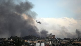 Israeli helicopter flies over Khan Younis, Gaza Strip.