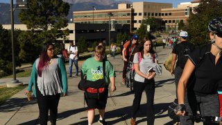 Students walk through campus at University of Colorado Colorado Springs