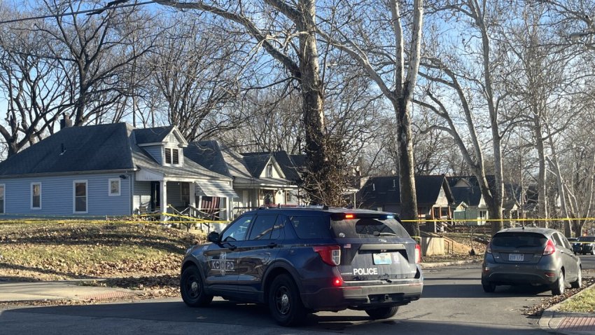 Police and EMS personnel respond to a house in Kansas City, MO.