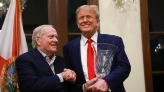 Retired professional golfer Jack Nicklaus presents Republican presidential candidate and former President Donald Trump with the 2024 Trump International Golf Club Most Improved Player award on March 24, 2024, in West Palm Beach, Florida. 