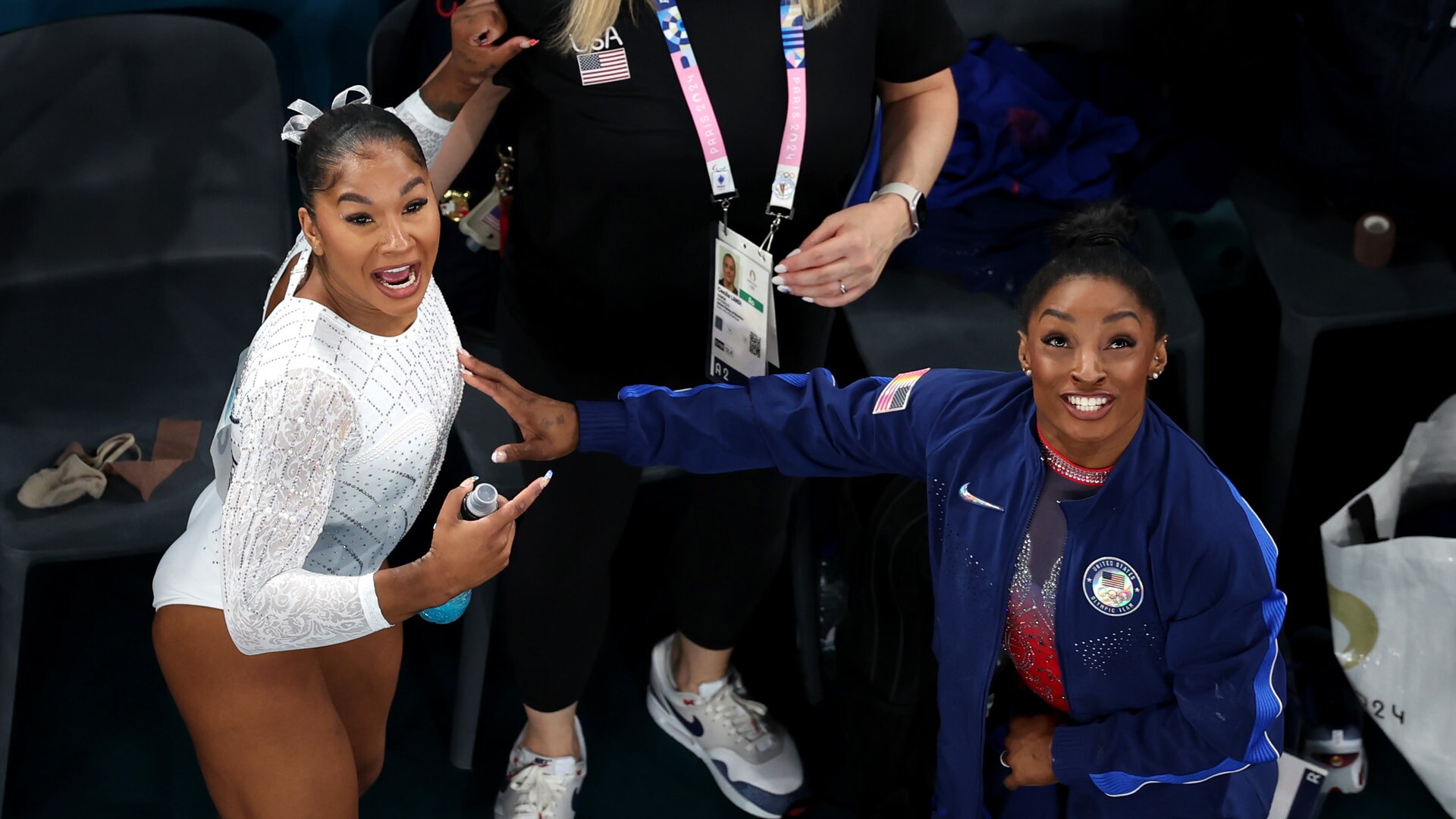 Jordan Chiles and Simone Biles of Team USA celebrate their bronze and silver medals, respectively, at the women's gymnastics individual floor final at the 2024 Paris Olympics.