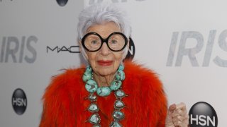 FILE -Iris Apfel attends the premiere of "Iris" at the Paris Theatre on Wednesday, April 22, 2015, in New York. Iris Apfel, a textile expert, interior designer and fashion celebrity known for her eccentric style, has died