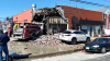 Fire truck smashes through store on Long Island