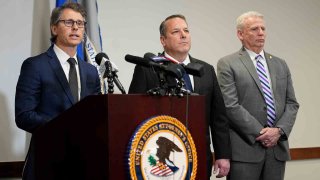 U.S. Attorney for the Middle District of Tennessee Henry C. Leventis, left, speaks during a news conference with investigators FBI Special Agent, Douglas DePodesta, center, and Special Agent Roy Cochran senior counterintelligence executive with the U.S. Army, right, on March 7, 2024, in Nashville, Tenn.